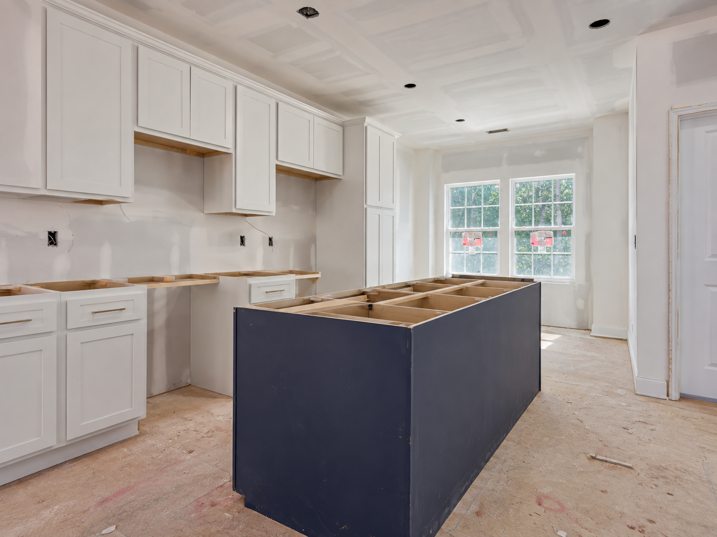 Kitchen cabinets during installation